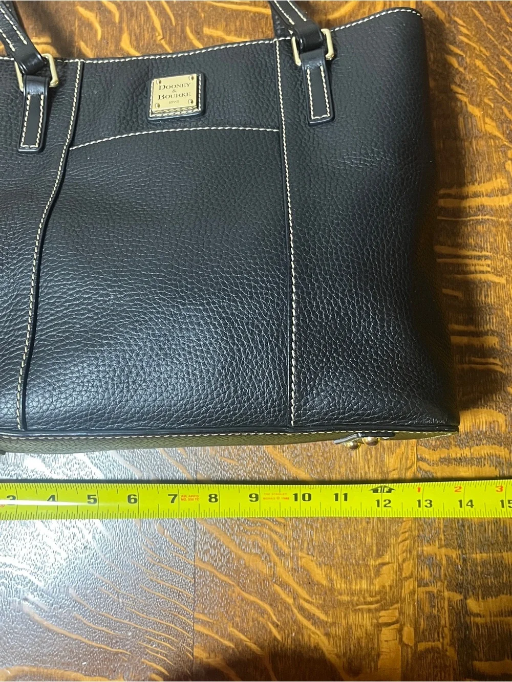 Dooney & Bourke Black Pebbled Leather Lexington Shoulder Tote with gold tone.